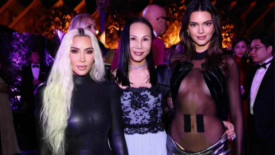 (L-R) Kim Kardashian, LACMA Art + Film Gala Co-Chair Eva Chow, wearing Gucci, and Kendall Jenner attend the 2022 LACMA ART+FILM GALA.