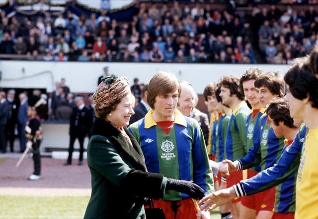 Kenny Dalglish introduces The Queen to members of the Glasgow Select XI