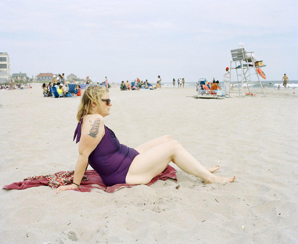 <div class="caption-credit"> Photo by: Jen Davis Photo</div>Untitled: "In the previous beach shot, I'm surrounded by my friends," says <a rel="nofollow noopener" href="http://jendavisphoto.com/" target="_blank" data-ylk="slk:Davis;elm:context_link;itc:0;sec:content-canvas" class="link ">Davis</a>. "In this new photo, I've lost quite a bit of weight and am surrounded by strangers which represent me being out in the world and functioning. I'm not covered up anymore."