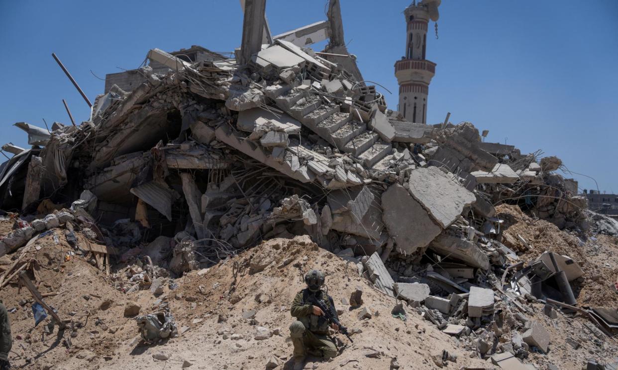 <span>Roads have been widened for the military in Rafah surrounded by total destruction.</span><span>Photograph: Ohad Zwigenberg/Reuters</span>