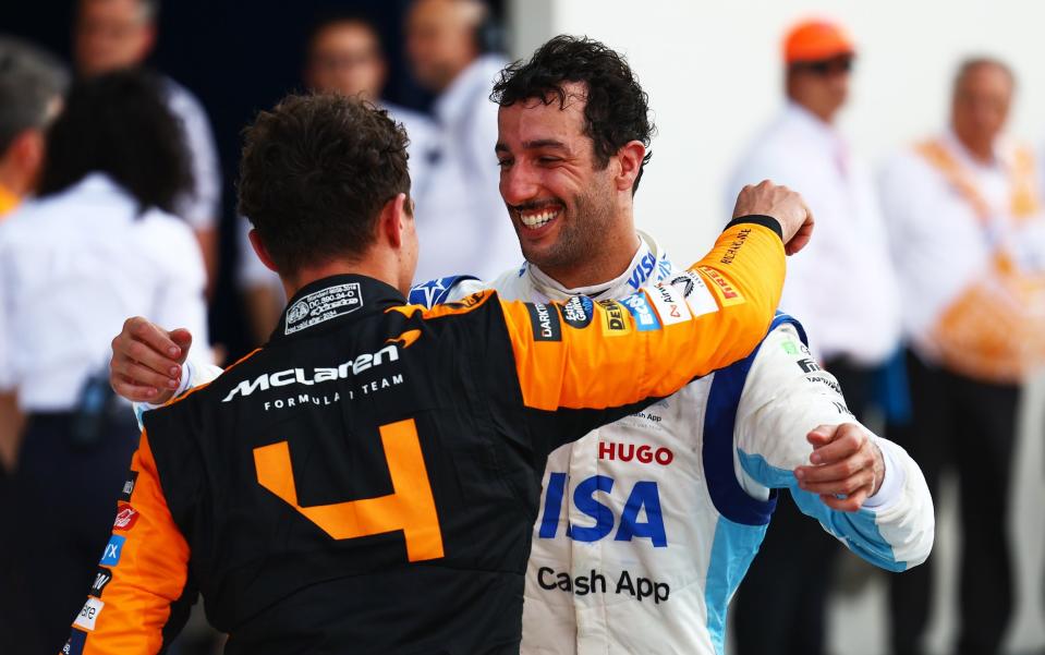 Lando Norris and Daniel Ricciardo embrace