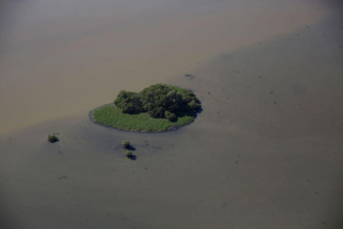 <p>This July 5, 2016 photo, shows an aerial view of a polluted lagoon near Olympic Park in Rio de Janeiro, Brazil. Promises to clean up Rio’s waterways stretch back decades, with a succession of governors setting firm dates for a cleanup and repeatedly pushing them back. (AP Photo/Felipe Dana)