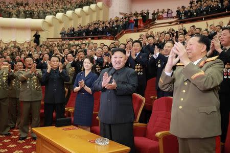 North Korean leader Kim Jong Un claps during a celebration for nuclear scientists and engineers who contributed to a hydrogen bomb test, in this undated photo released by North Korea's Korean Central News Agency (KCNA) in Pyongyang on September 10, 2017. KCNA via REUTERS