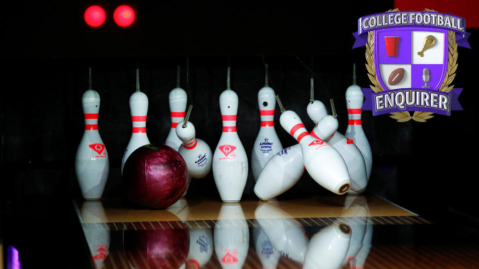 A bowling ball strikes pins in England
REUTERS/Peter Cziborra