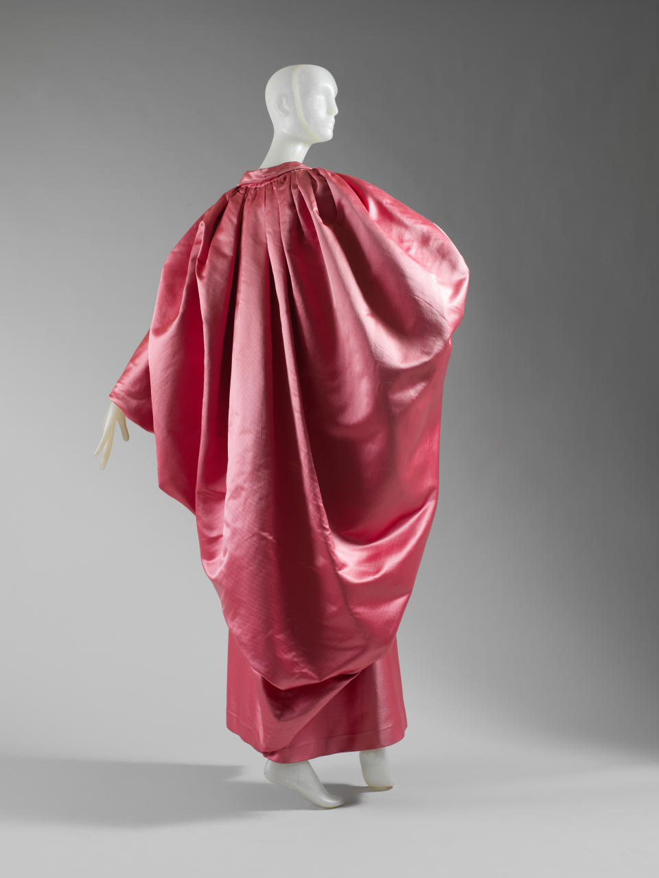 A 1951 evening wrap by Cristóbal Balenciaga is featured. - Credit: Photo Courtesy The Metropolitan Museum of Art