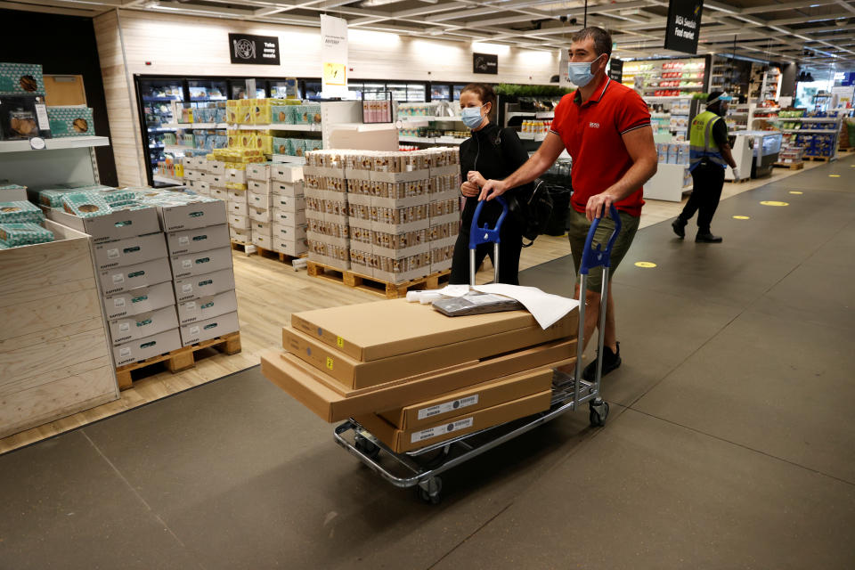 IKEA People wearing masks shop at Ikea in Tottenham as it re-opens, following the outbreak of the coronavirus disease (COVID-19), London, Britain, June 1, 2020. REUTERS/John Sibley