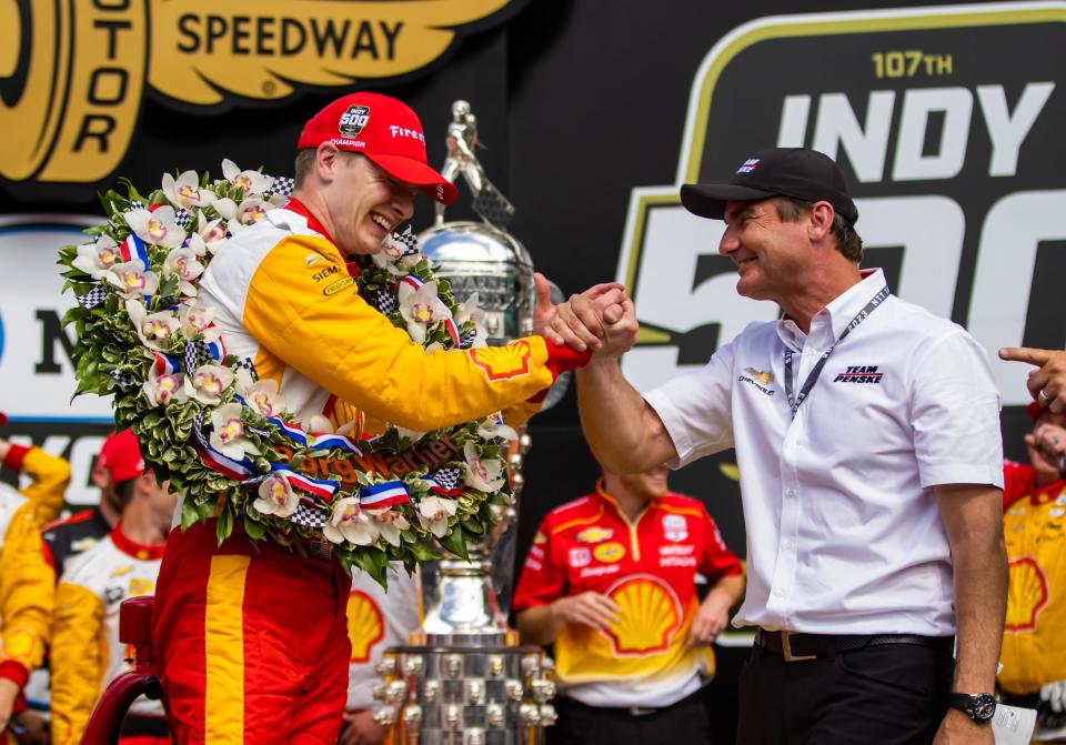 IndyCar Series driver Josef Newgarden celebrates with team official Tim Cindric after winning the Indianapolis 500 at Indianapolis Motor Speedway in May.