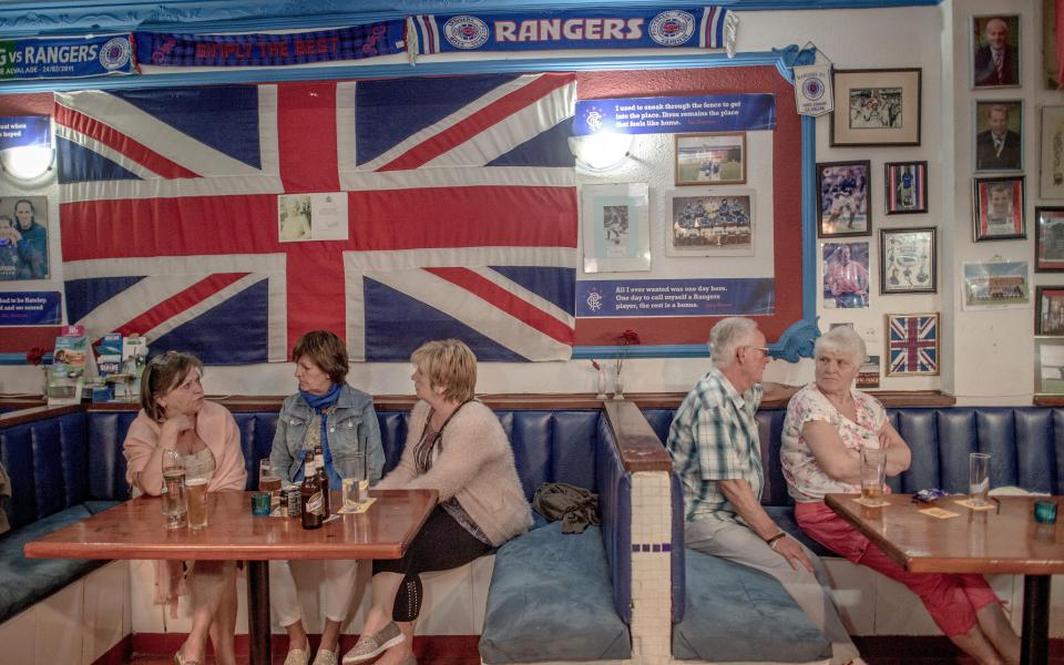 British tourists have drinks at a English bar on March 17, 2016 in Benalmadena, Spain - 2016 Getty Images