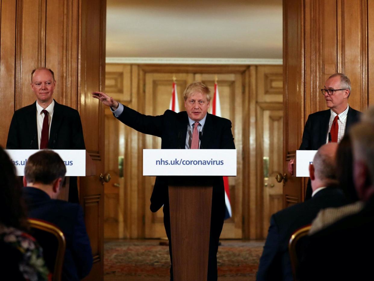 Boris Johnson alongside chief medical officer Chris Whitty (left) and chief scientific adviser Sir Patrick Vallance: PA