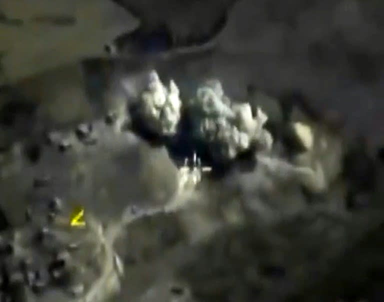 A video grab purportedly showing an explosion after a Russian air strike on an underground explosives warehouse in Raqa, Syria