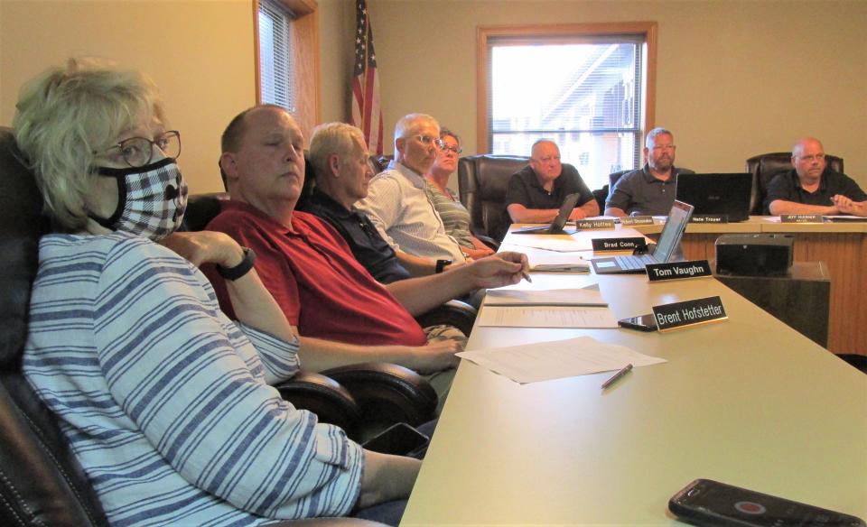 Millersburg council members listen as Police Chief Matt Shaner refutes claims about his department.