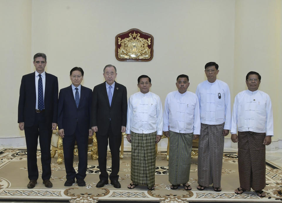 In this photo provided by the Myanmar Military True News Information Team, Senior Gen. Min Aung Hlaing, center, head of the military council, poses for photo together with Ban Ki Moon, third from left, former U.N Secretary-General, during their meeting Monday, April 24, 2023, in Naypyitaw, Myanmar. (Military True News Information Team via AP)