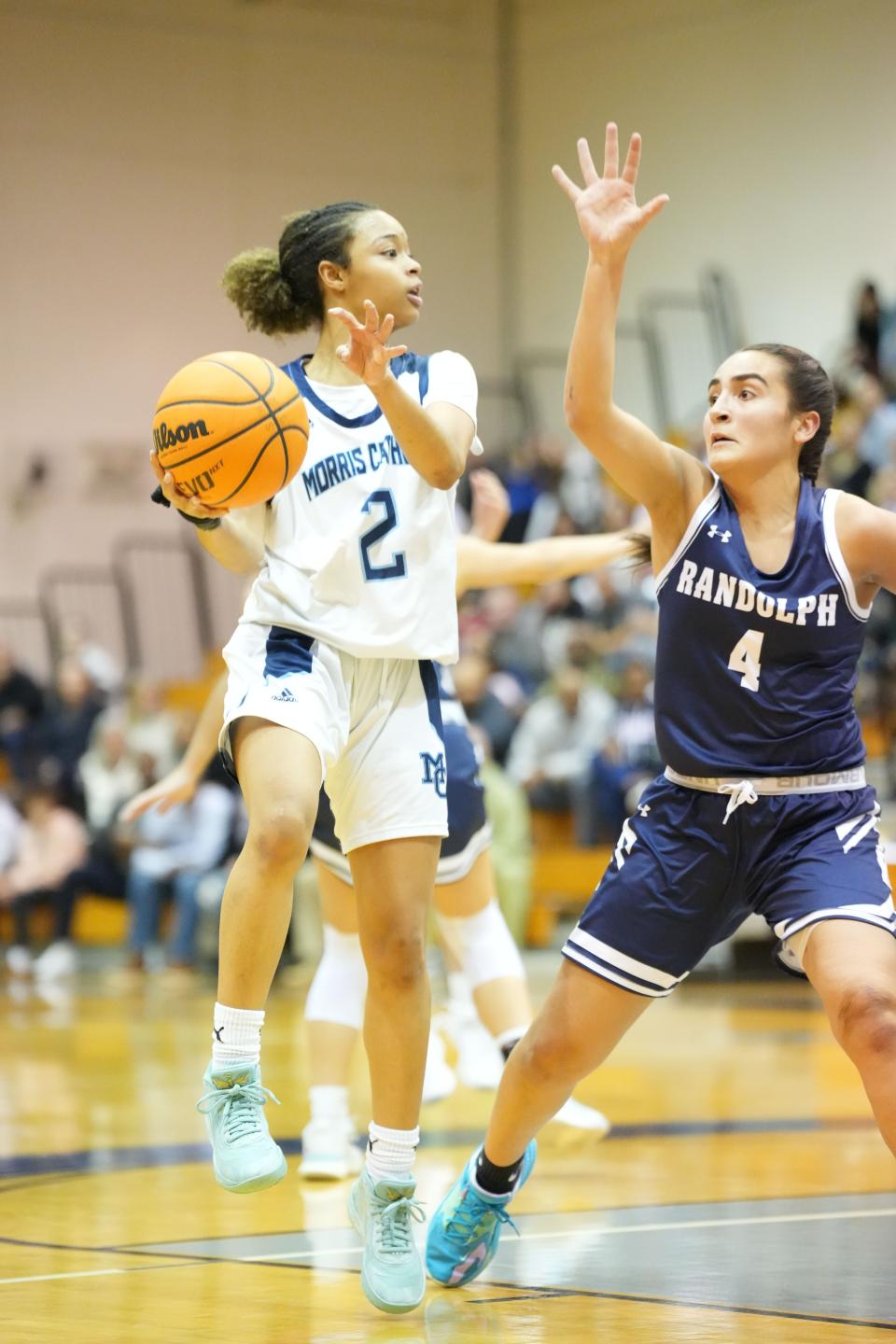 Morris Catholic vs. Randolph in the Morris County Tournament Girls Basketball Semifinals at the County College of Morris on Friday, February 10, 2023. MC #2 Mya Pauldo tries to get past R #4 Aliyah Lambo. 