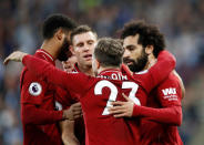 Soccer Football - Premier League - Huddersfield Town v Liverpool - John Smith's Stadium, Huddersfield, Britain - October 20, 2018 Liverpool's Mohamed Salah celebrates scoring their first goal with team mates Action Images via Reuters/Carl Recine