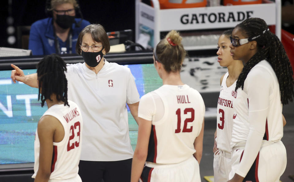 Stanford head coach Tara VanDerveer talks to her team during the second half of an NCAA college basketball game against UCLA in the Pac-12 women's tournament championship Sunday, March 7, 2021, in Las Vegas. (AP Photo/Isaac Brekken)