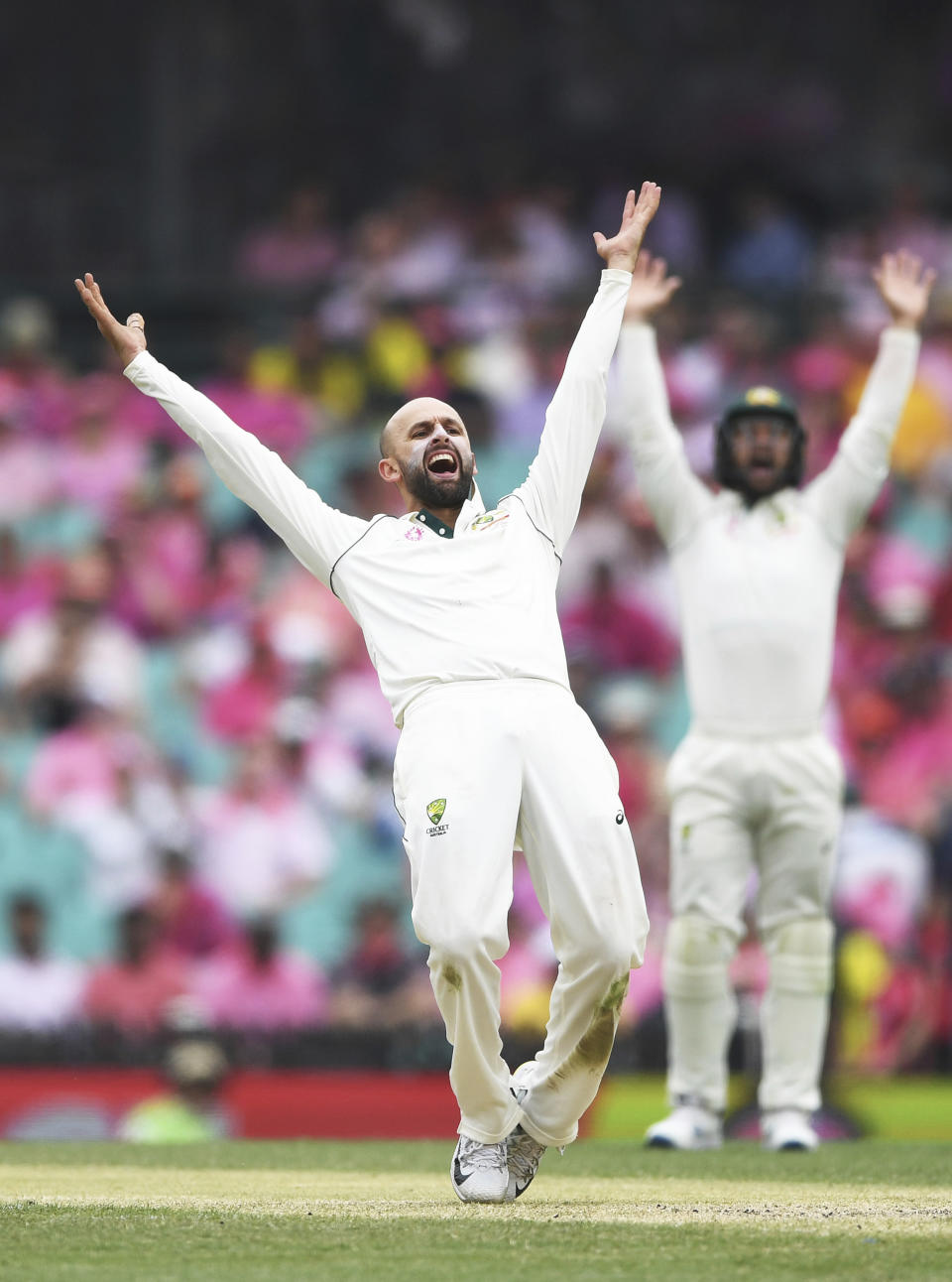 Australia's Nathan Lyon appeals unsuccessfully for an LBW decision on New Zealand's Glenn Phillips during play on day three of the third cricket test match between Australia and New Zealand at the Sydney Cricket Ground in Sydney Sunday, Jan. 5, 2020. (Andrew Cornaga/Photosport via AP)