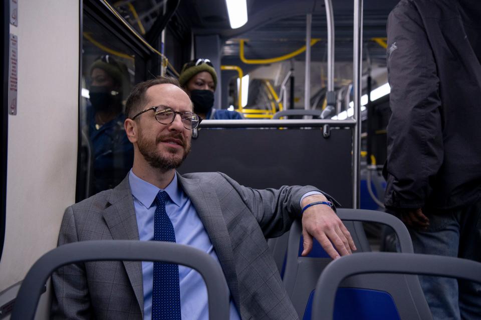 Nashville Mayor Freddie O'Connell rides the bus following a press conference at the Historic Metropolitan Courthouse in Nashville, Tenn., Thursday, Feb. 15, 2024.