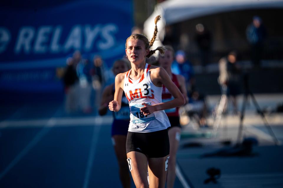 Ames' Lauren Risdal runs during the girls 3000 at the Drake Relays on Thursday.