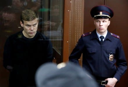 FILE PHOTO: Russian soccer player Alexander Kokorin, who was detained and accused of carrying out attacks, attends a court hearing in Moscow, Russia October 11, 2018. REUTERS/Sergei Karpukhin/File Photo