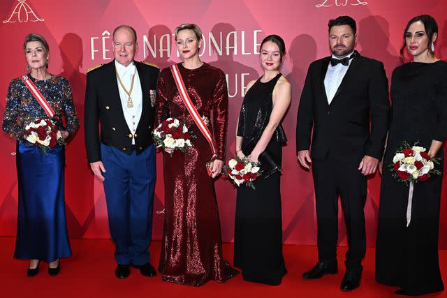 <p>Stephane Cardinale/PLS Pool/Getty</p> Princess Caroline of Hanover, Prince Albert II of Monaco, Princess Charlene of Monaco, Princess Alexandra of Hanover, Sean Wittstock and his wife Chantell Violet Serfontein attend a gala at the Grimaldi Forum during Monaco National Day 2023.