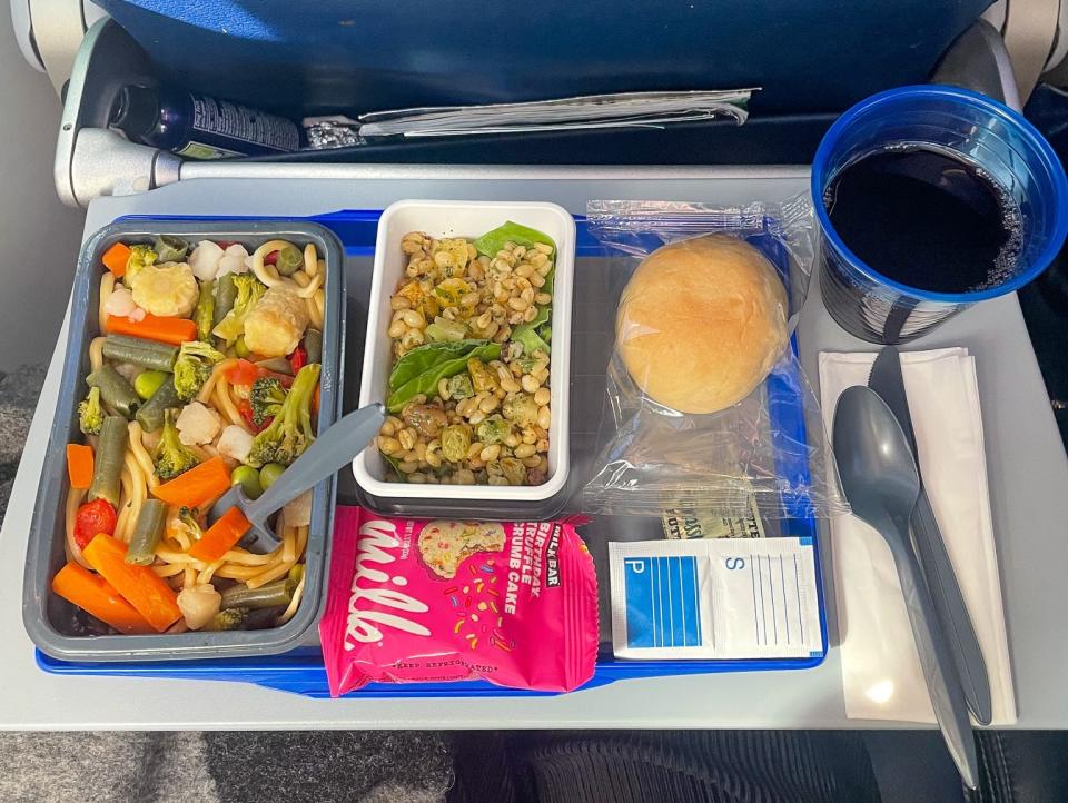 The tray table in economy.