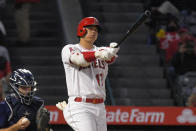 Los Angeles Angels designated hitter Shohei Ohtani strikes out during the first inning of a baseball game against the Seattle Mariners Friday, Sept. 24, 2021, in Anaheim, Calif. (AP Photo/Mark J. Terrill)