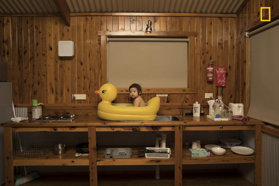 On a family holiday driving from Sydney to Uluru, we stopped at a roadside motel in the small rural township of Nyngan, on the edge of Australia&rsquo;s outback. The area is in the wheat belt, and it was unusually hot for that time of year -- over a hundred degrees Fahrenheit and very dusty. Our daughter, Genie, is seen here enjoying a refreshing bath in a rubber ducky perched on the sink.