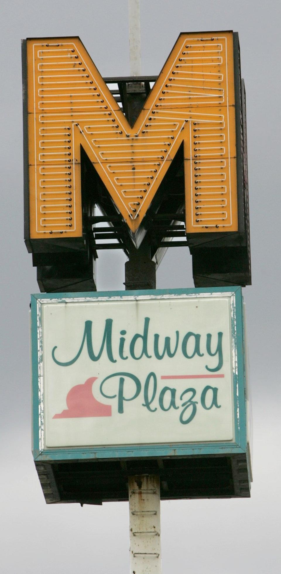 This well-known sign towers over Midway Plaza in 2011