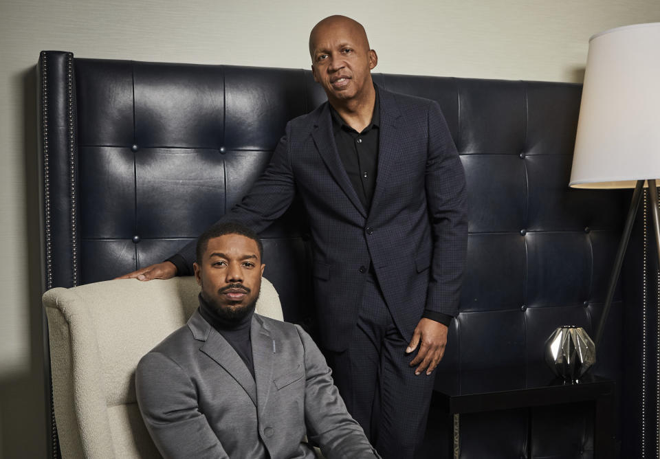 This Dec. 16, 2019 photo shows actor Michael B. Jordan, left, and civil rights attorney Bryan Stevenson posing for a portrait in New York to promote the film "Just Mercy." (Photo by Matt Licari/Invision/AP)