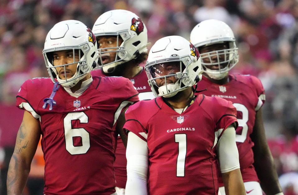 Jan 9, 2022; Glendale, Arizona, USA; Arizona Cardinals quarterback Kyler Murray (1) and  running back James Conner (6) reacts to a Cardinals offensive holding penalty against the Seattle Seahawks in the first half at State Farm Stadium. Mandatory Credit: Rob Schumacher-Arizona Republic