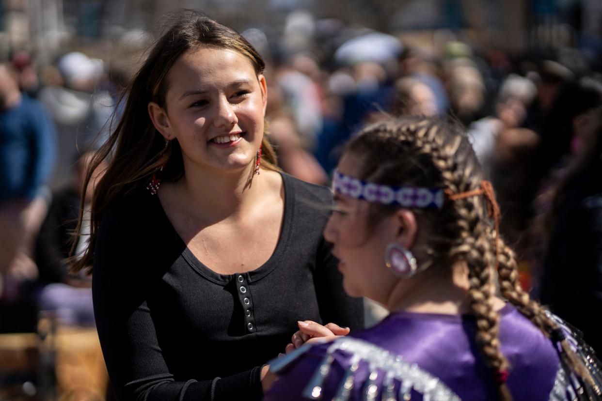 Ella Bither (left) and Olivia Taunah, members of the Houlton band of Maliseet Indians, perform a friendship dance before the solar eclipse in Houlton, Maine, the easternmost city in the United States in the path of the eclipse.