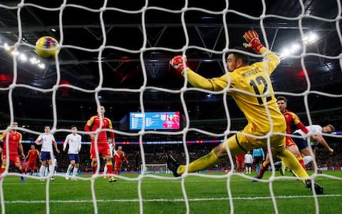 Harry Kane scores against Montenegro - Credit: reuters