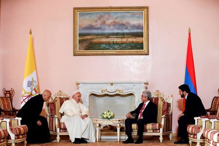 Pope Francis meets Armenian President Serzh Sargsyan (2nd R) in Yerevan's Presidential Palace, Armenia, June 24, 2016. REUTERS/Andrew Medichini/Pool