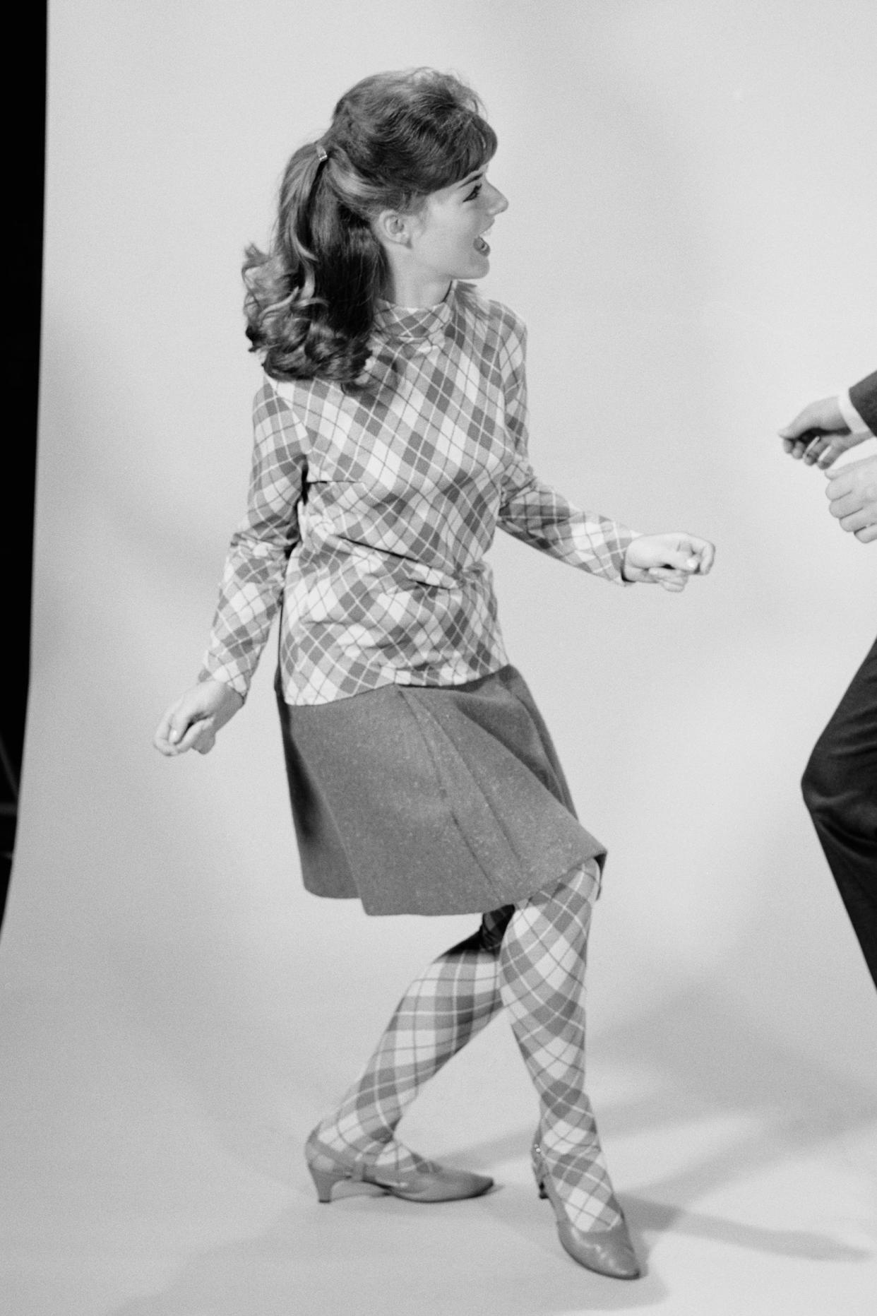 couple dancing the twist in the 1960s