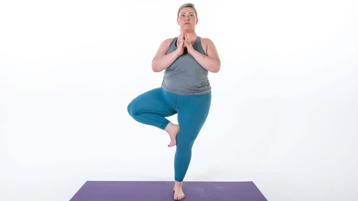 Woman demonstrates Tree Pose