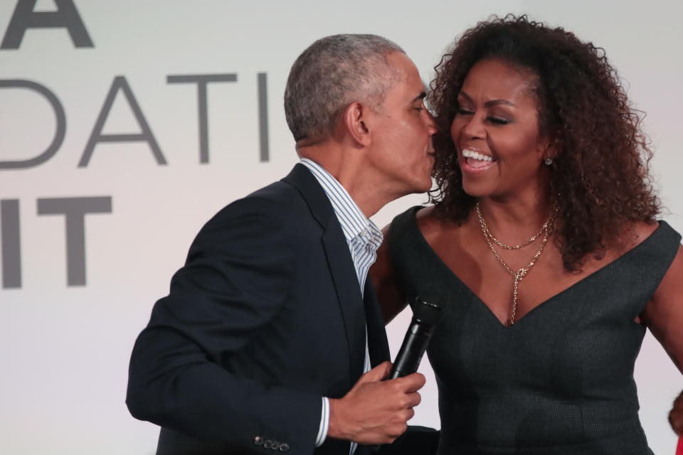 CHICAGO, ILLINOIS - OCTOBER 29: Former U.S. President Barack Obama gives his wife Michelle a kiss as they close the Obama Foundation Summit together on the campus of the Illinois Institute of Technology on October 29, 2019 in Chicago, Illinois. The Summit is an annual event hosted by the Obama Foundation. (Photo by Scott Olson/Getty Images)