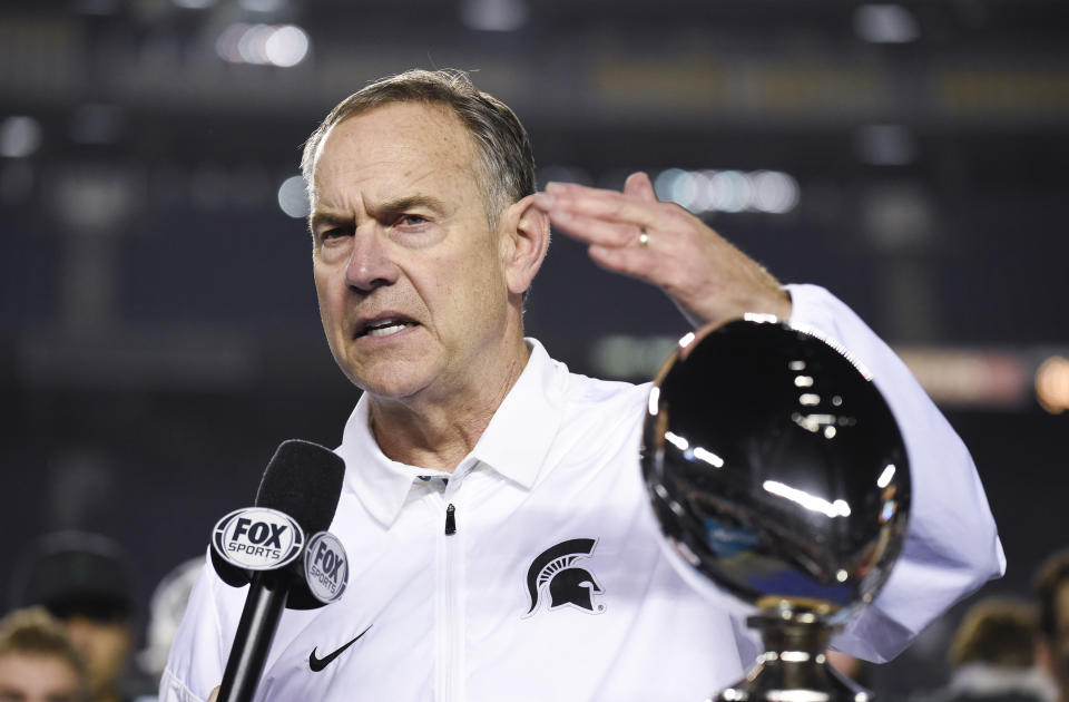 MSU head coach Mark Dantonio denied reports of his role in covering up sexual misconduct. (AP)