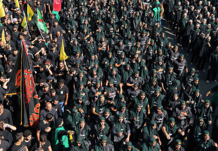 Lebanon's Hezbollah supporters chant slogans during last day of Ashura, in Beirut, Lebanon September 20, 2018. REUTERS/Aziz Taher