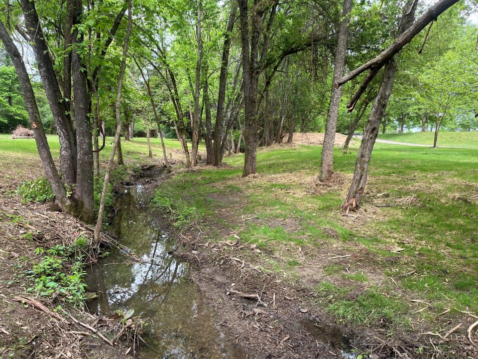 As is shown from this photo taken on April 30, 2024, Knoxville city parks officials have recently cleared out a lot of brush and growth around the small ditch in West Hills Park for environmental and beautification reasons.