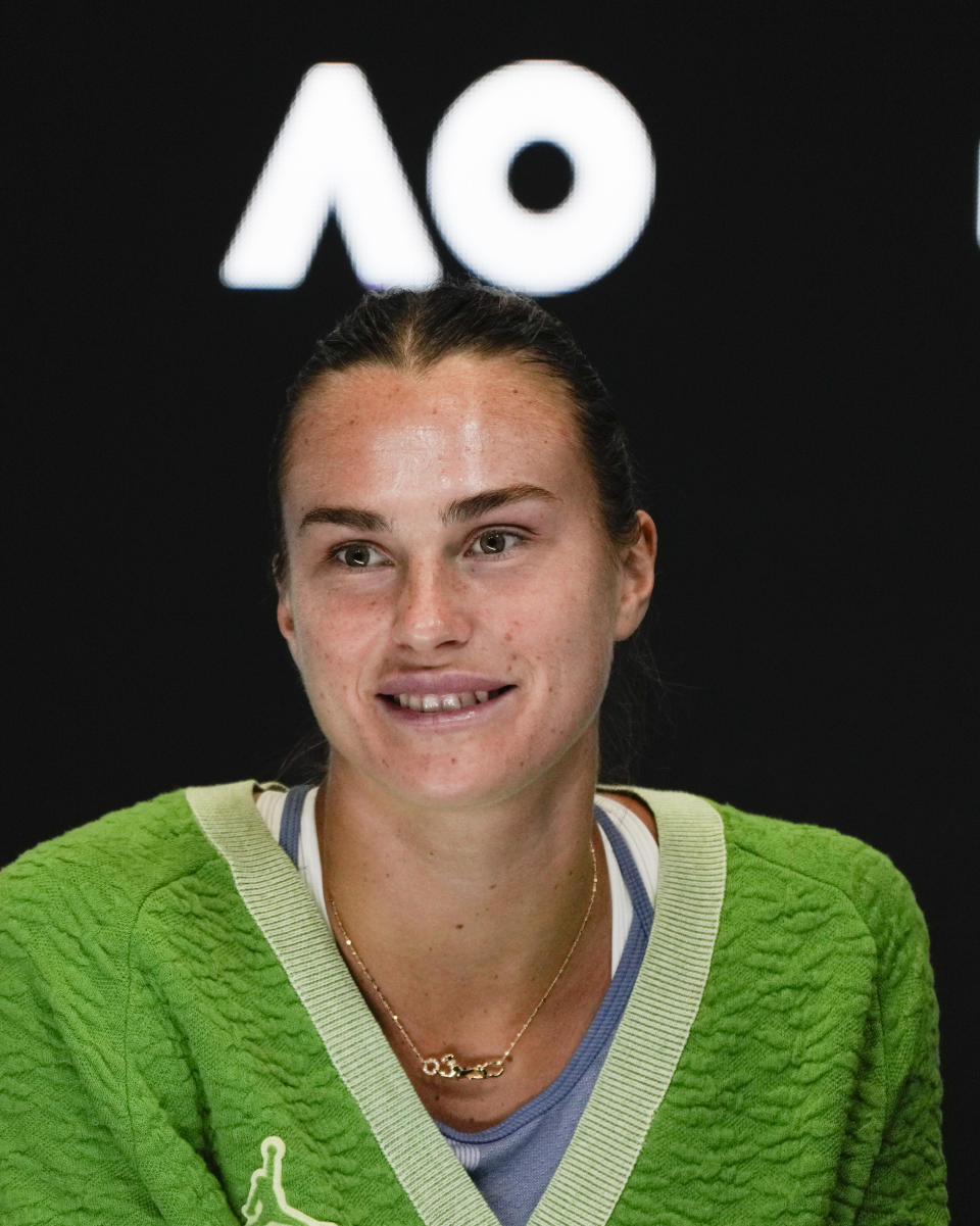 Arena Sabalenka of Belarus reacts during a press conference ahead of the Australian Open tennis championships at Melbourne Park, Melbourne, Australia, Friday, Jan. 12, 2024. (AP Photo/Andy Wong)
