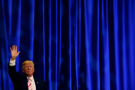 U.S. President Donald Trump waves to the crowd at a campaign rally for Senator Luther Strange in Huntsville, Alabama, U.S. September 22, 2017. REUTERS/Aaron P. Bernstein