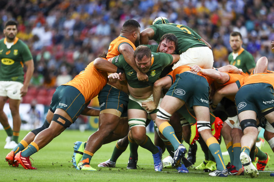 South Africa's Duane Vermeulen, centre, leads his forwards during the Rugby Championship test match between the Springboks and the Wallabies in Brisbane, Australia, Saturday, Sept. 18, 2021. (AP Photo/Tertius Pickard)