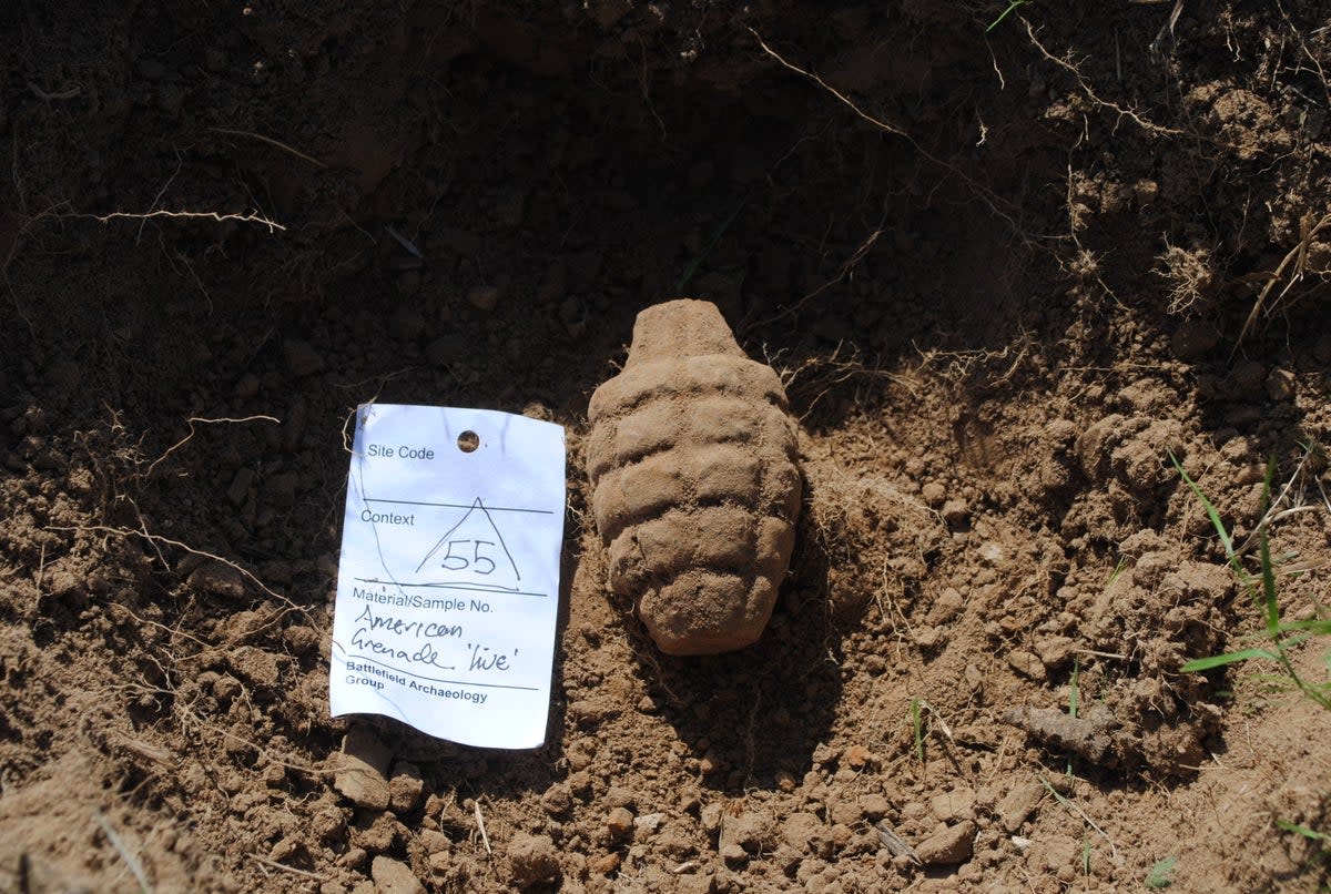 An unexploded American hand grenade found immediately adjacent to a German dugout (Battlefield Archaeology Group)