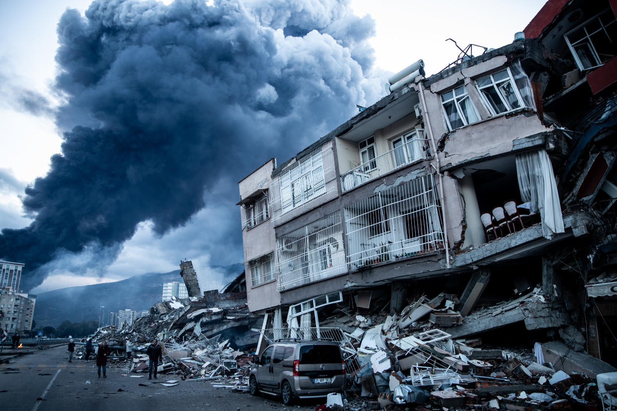 Smoke and collapsed buildings in Iskenderun.