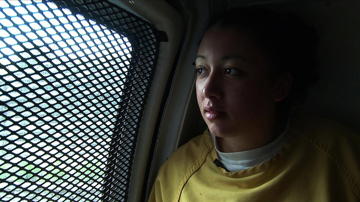 Cyntoia&nbsp;Brown, now 30, has served 13 years in prison for a 2004 murder.&nbsp;Here she's seen riding to the courthouse during her criminal trial in 2006, in a scene from the&nbsp;documentary "<a href="http://www.pbs.org/independentlens/videos/me-facing-life-cyntoias-story/" target="_blank">Me Facing Life: Cyntoia&rsquo;s Story</a>."