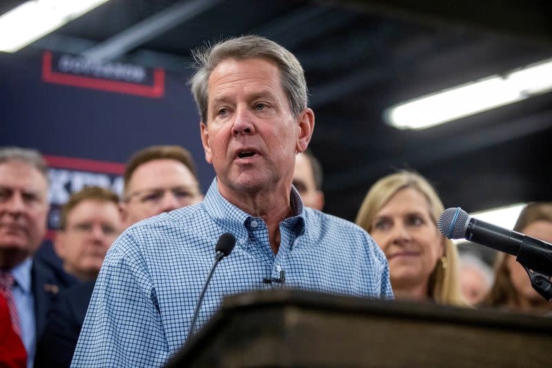 FILE PHOTO: Georgia's Governor Brian Kemp visits Adventure Outdoors gun shop in Smyrna