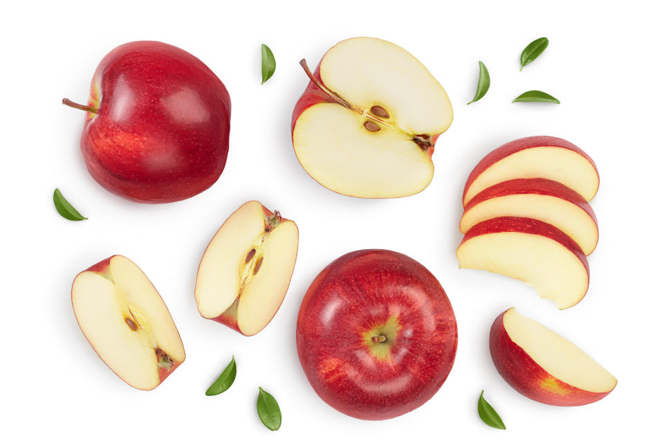 Red apple with half isolated on white background with clipping path and full depth of field. Top view. Flat lay. Set or collection.