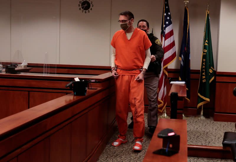 James Crumbley, the father of accused Oxford High School gunman Ethan Crumbley, enters the court room during a court procedural hearing