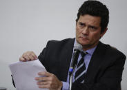 Brazil's Justice Minister Sergio Moro gives a press conference to announce his resignation in Brasilia, Brazil, Friday, April 24, 2020. Moro made the announcement after Brazilian President Jair Bolsonaro changed the head of the country's federal police. (AP Photo/Eraldo Peres)