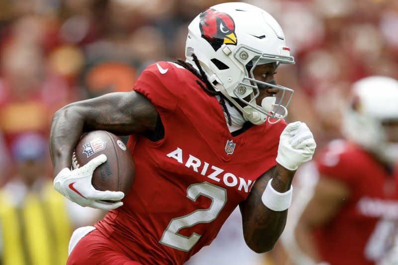 Arizona Cardinals wide receiver Marquise Brown runs the ball past the Washington Commanders on Sunday at FedEx Field in Landover, Md. Photo by Tasos Katopodis/UPI